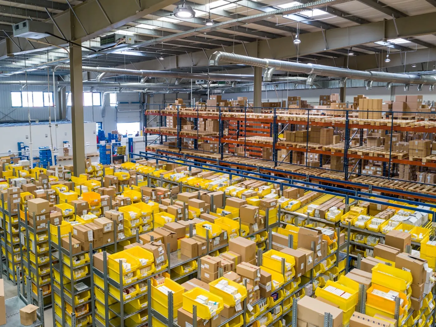 Fulfilment centre pick bins and cartons prepared for B2B dispatch in the UAE